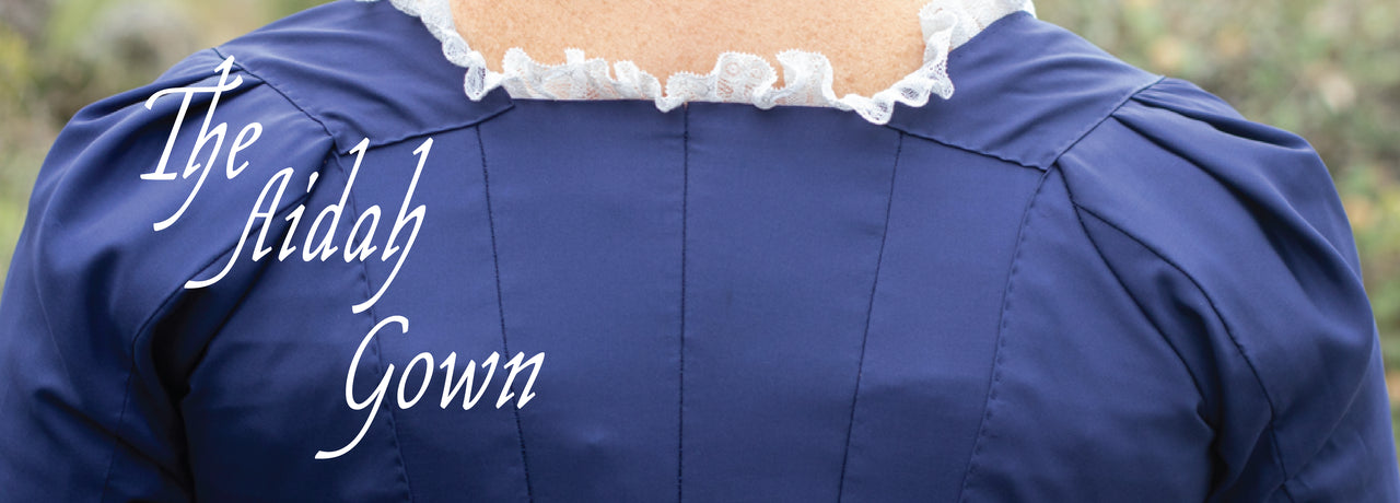 Banner reads 'The Aidah Gown' over a detail of the back seams and pleated sleeves of a cobalt blue silk dress
